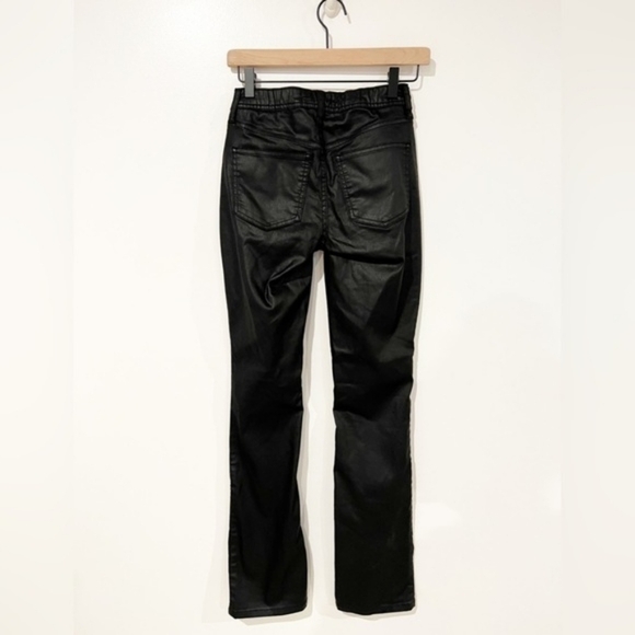 $118 Free People Spellbound Split Hem Black Coated High Rise Jeans - Picture 6 of 16